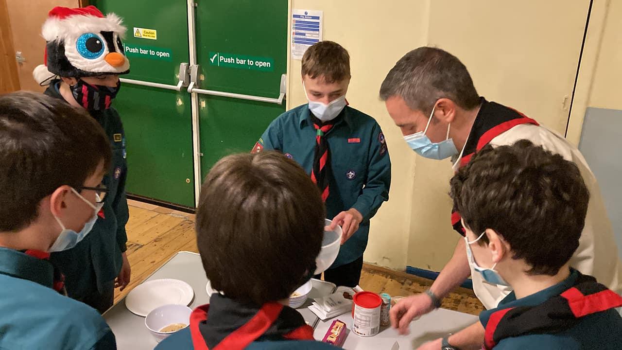 Scouts making treats close