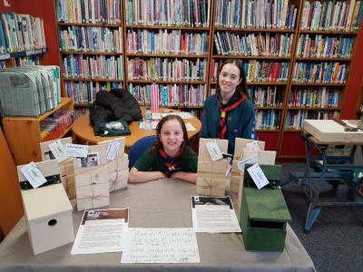 Scout girls fund raising at table